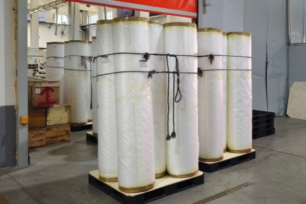 BOPP Film Storage and Production Tips for the Rainy Season place rolls on pallets